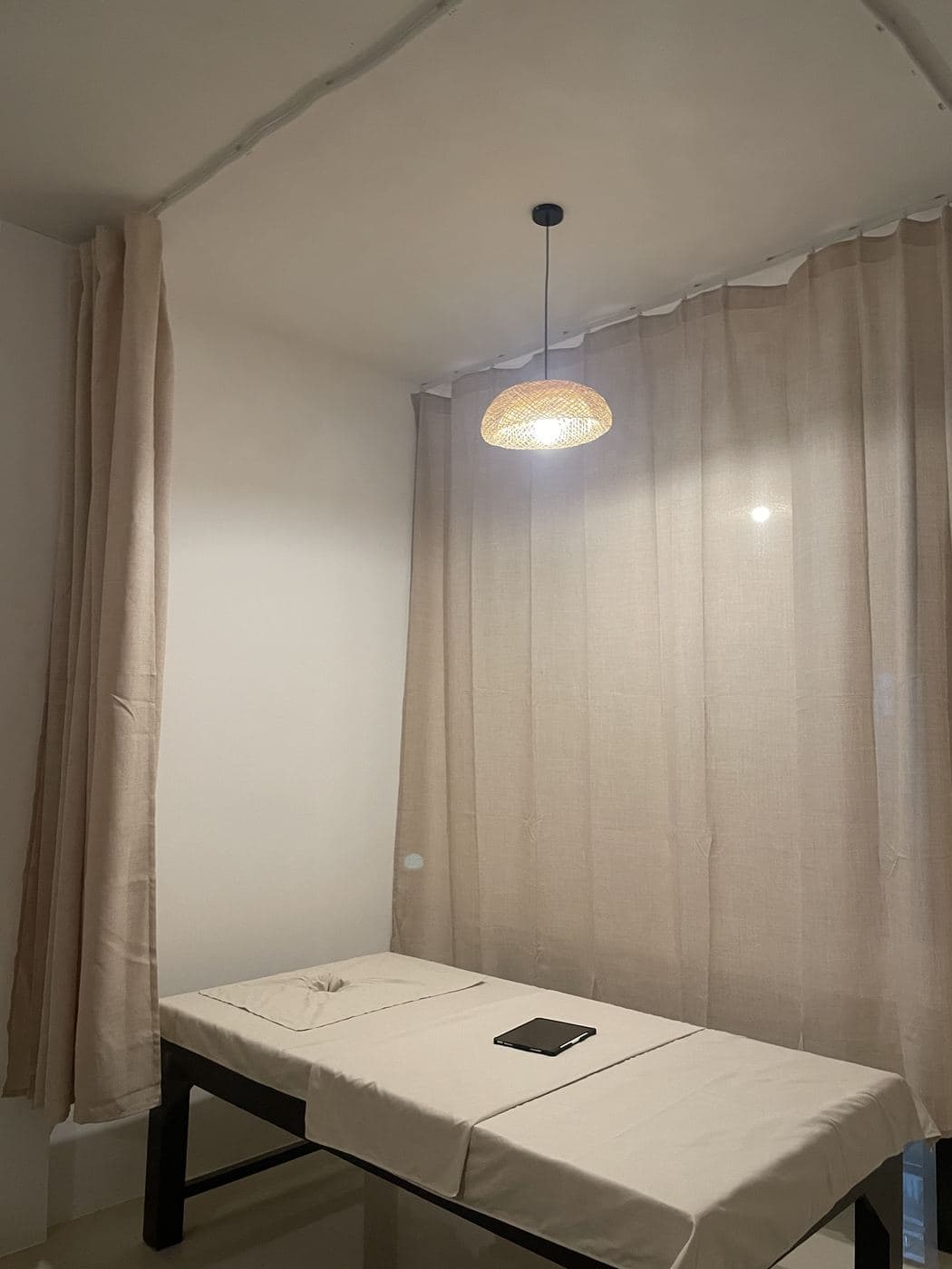 A curtained treatment room